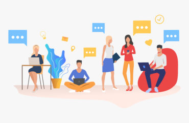 People using digital devices in modern office