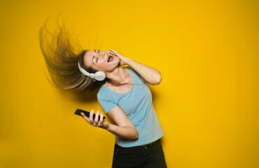 photography-of-woman-listening-to-music-761963